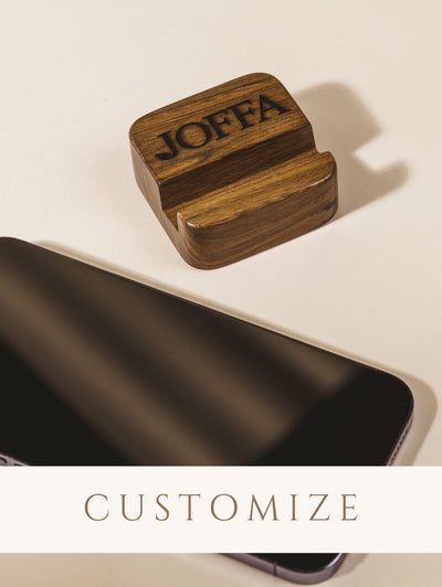 Wood cell phone stand with custom logo design. 