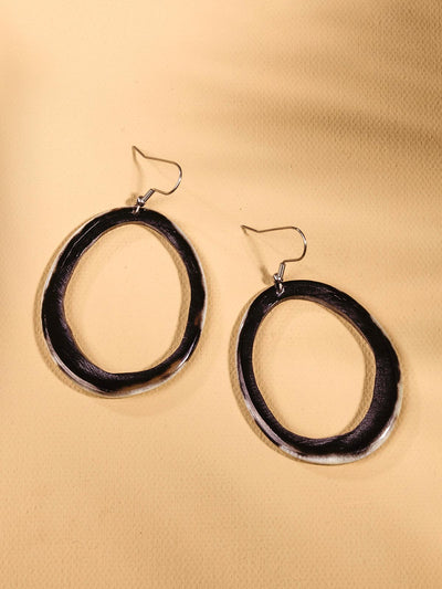 Horn Hoop Earrings. Large hoop shape with  black, brown, and white color tones