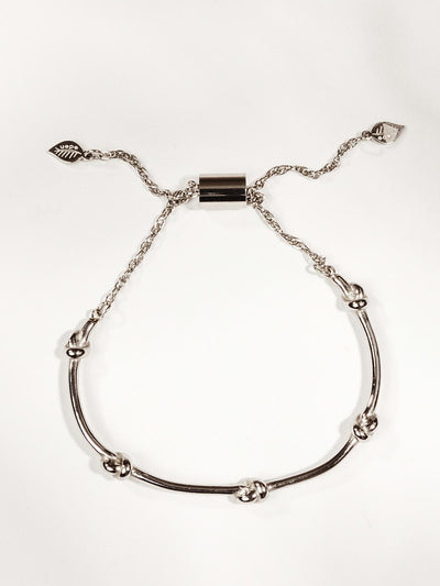 adjustable silver bracelet with knots and a silver chain