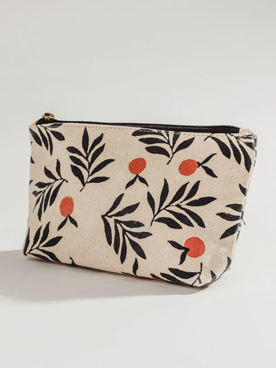 Waterproof berry patterned pouch on white table 