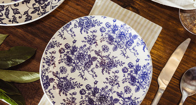 White and gold ring dish made of clay in a shape of a heart