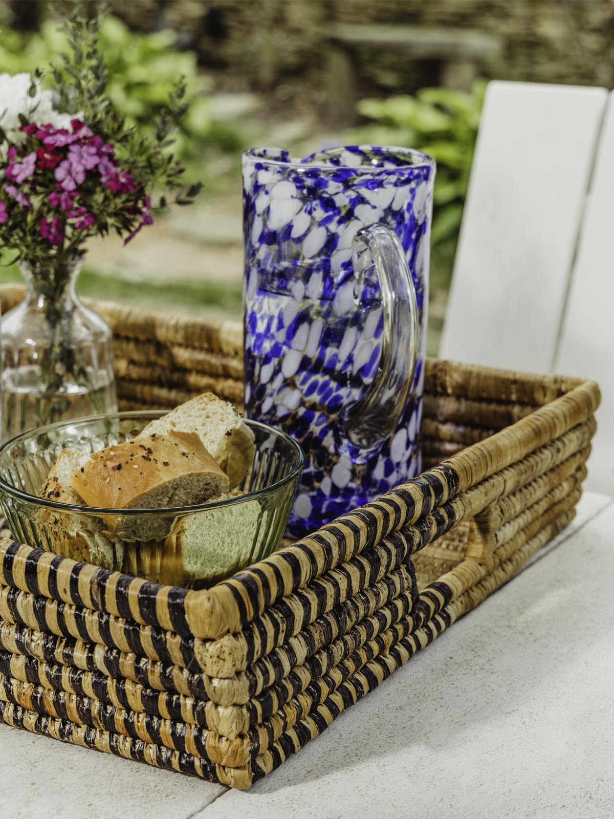 Square woven basket with pitcher inside