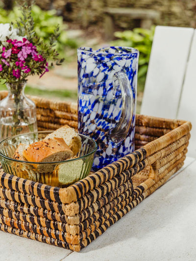 Square woven basket with pitcher inside