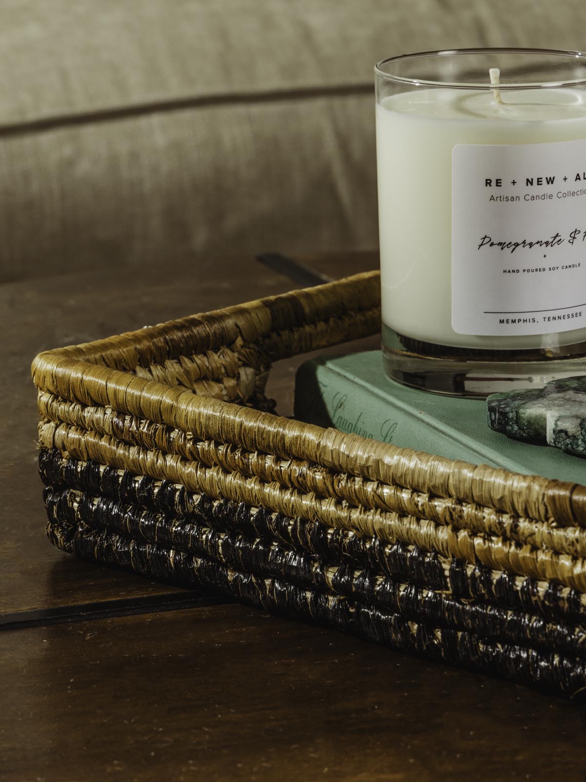 square basket on table with candle