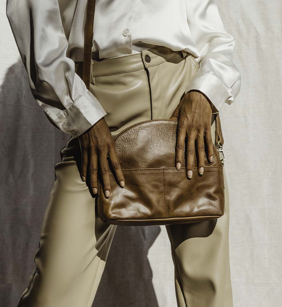 Small leather oval handbag