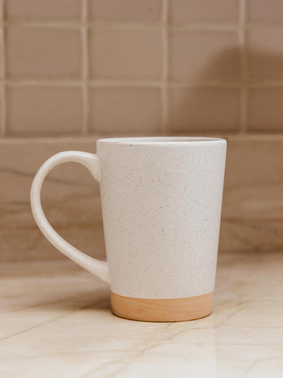 16 oz speckle ceramic mug on kitchen counter.