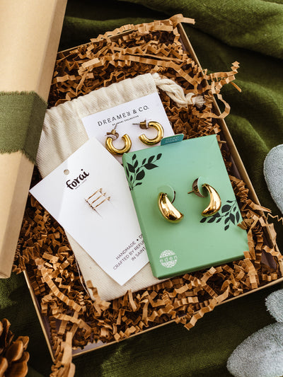 Artisan-made jewelry box featuring Dreamer & Co hoops, Forai minimalist earrings, and Eden gold hoops – sustainable holiday gift idea