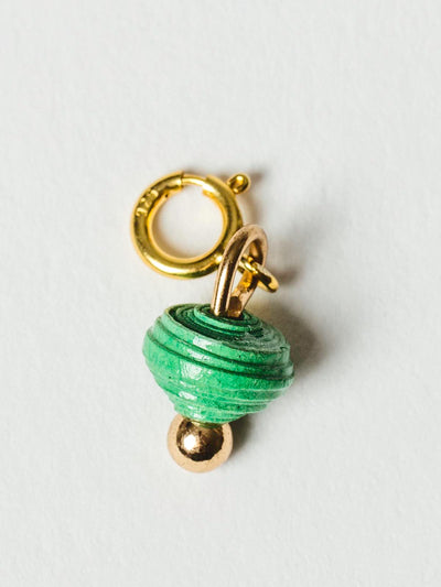 Medium green bead charm on gold clasp. 