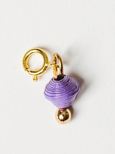 Purple bead charm on gold clasp. 