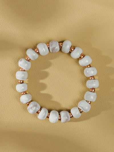 White and gold ceramic bead bracelet. 